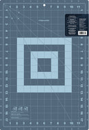 Fashion Cutting Mat 12in x 18in by Fiskars showing the grey teal side