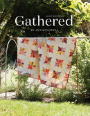 Gathered - Quilt Recipes 2 book cover showing quilt hanging outdoors in garden.