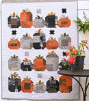 Hocus Pocus quilt on white fence