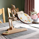 Nurge Embroidery Needlework Table or Seat Stand 190-14 on table with embroidery hoop