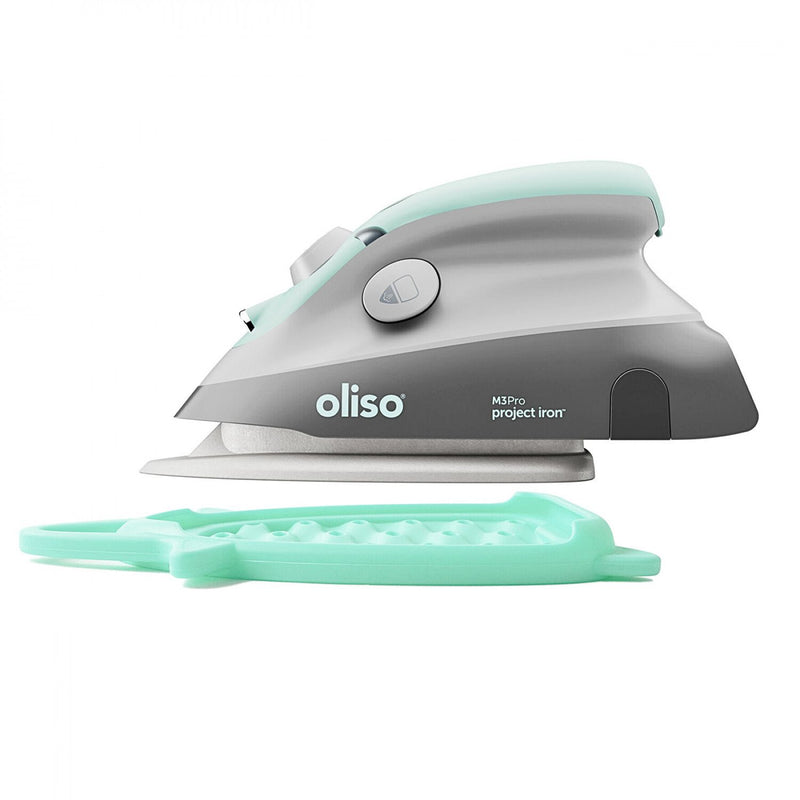 Oliso Mini Iron With Trivet Aqua Color Sitting on Trivet  M3PRO-AQUA