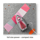 Oliso Mini Iron With Trivet Raspberry on wool mat pressing a project