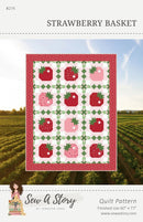 Quilt pattern cover for 'Strawberry Basket' by Sew a Story with strawberry design and field background.