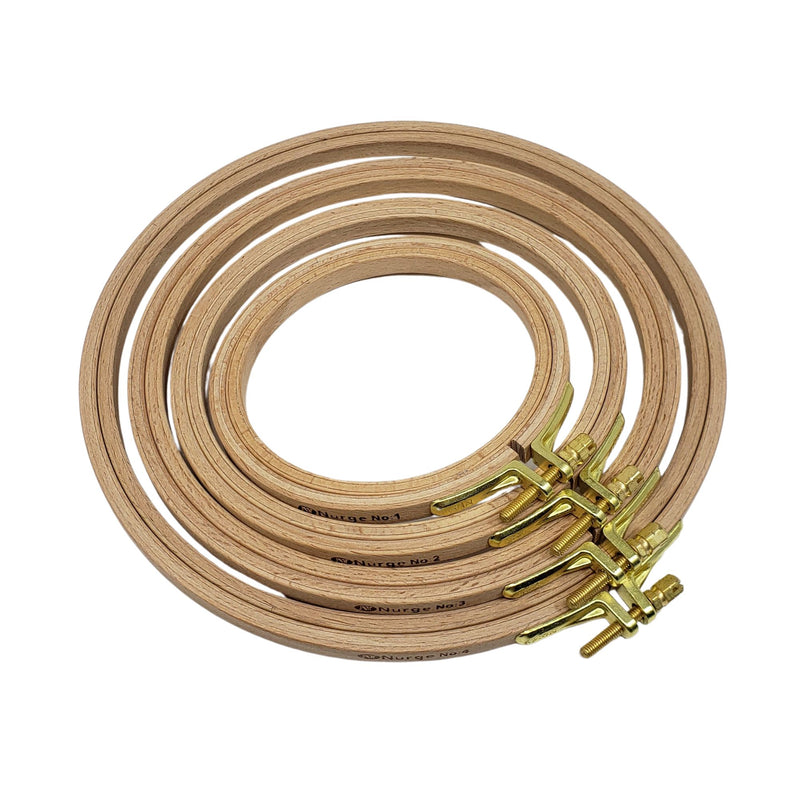 Nurge beech round embroidery hoops stacked in sizes 1-4 shown from above