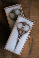 Botanical Garden Scissors in Antique  Finish in gift boxes on wooden surface.