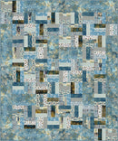 Brushstrokes Patchwork quilt with geometric pattern in blue and gray tones.