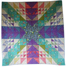 Charmed Life Free PDF Quilt Pattern is a colorful quilt with geometric pattern on a white background.