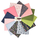 Daisy Mae and Friends Fat Quarter Bundle is shown as a fan arrangement of multiple fabric squares in assorted colors and patterns, including solid pink, navy floral, light blue, green, and white floral prints, with a dragonfly logo overlay in the center on a white background.
