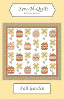 Quilt pattern cover titled 'Fall Garden' by Sew-N-Quilt with a design of pumpkins and flowers.