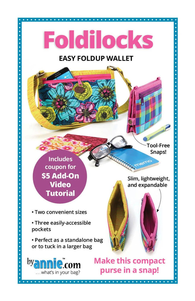 Foldilocks easy foldup wallet with colorful design and accessories on a white background