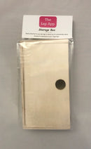 Lap App Storage box with a label on a gray background.