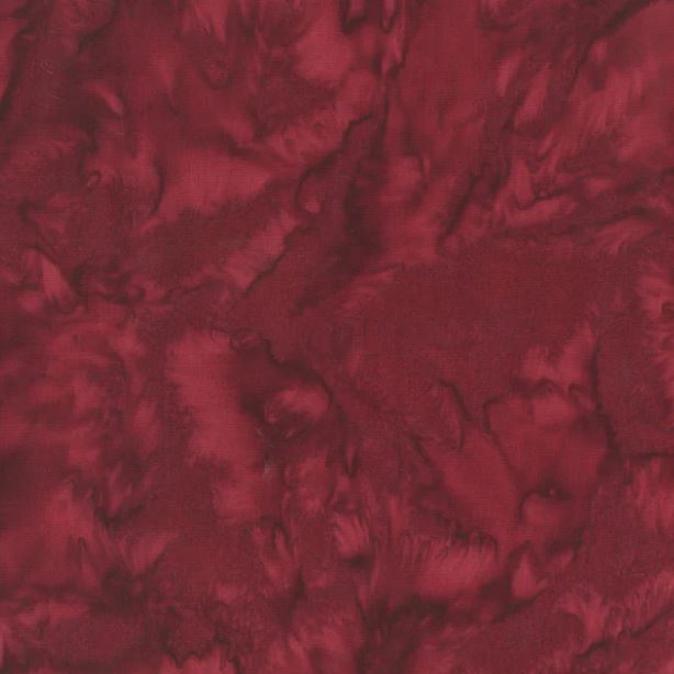 Lava Solids Batik 100Q-1483 Bordeaux by Anthology Fabrics.