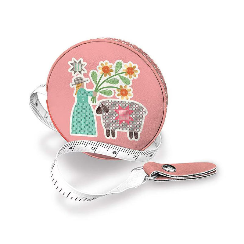 lori holt tape measure with pink sheep and girl design