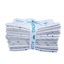 Low Volume Whites Fat Eighth Bundle shows stack of white fabric with small patterns tied with a ribbon on a white background.