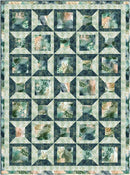Make it Scrappy with 3-Yard Quilts Quilt with a geometric pattern featuring nature-themed designs in various shades of green and blue.