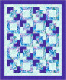 Make it Scrappy with 3-Yard  Quilt with a geometric pattern of squares in blue and purple on a light blue background