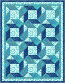 Make it Scrappy with 3-Yard Quilts Blue and white patterned quilt with geometric design
