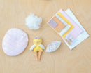 Mini Robine Chick Doll Kit contents on wooden surface.