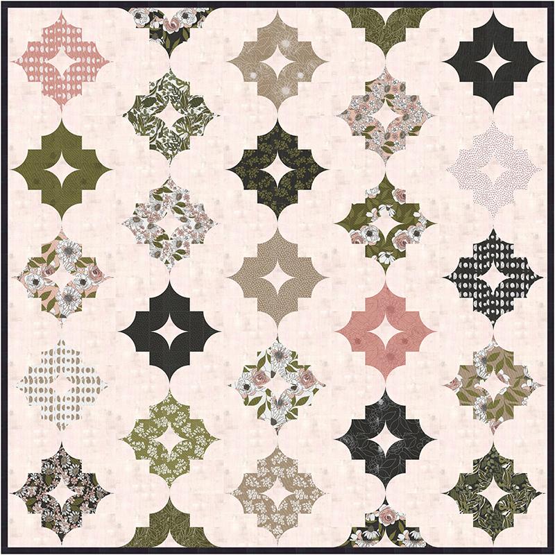 Nordic Nights quilt top shown in Botany fabrics.