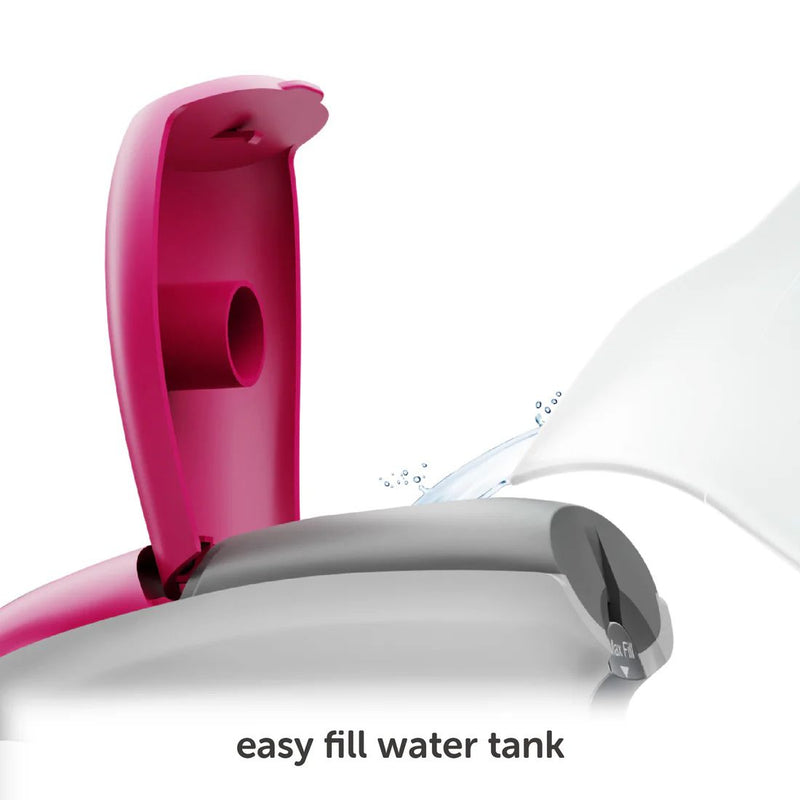 Oliso Mini Iron With Trivet Raspberry filling water tank