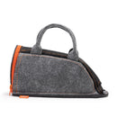 Oliso Project Iron Carry Bag in grey felt with orange zipper and stitching.