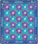Painted Sea Free PDF Quilt Pattern is a quilt with blue and purple squares. 