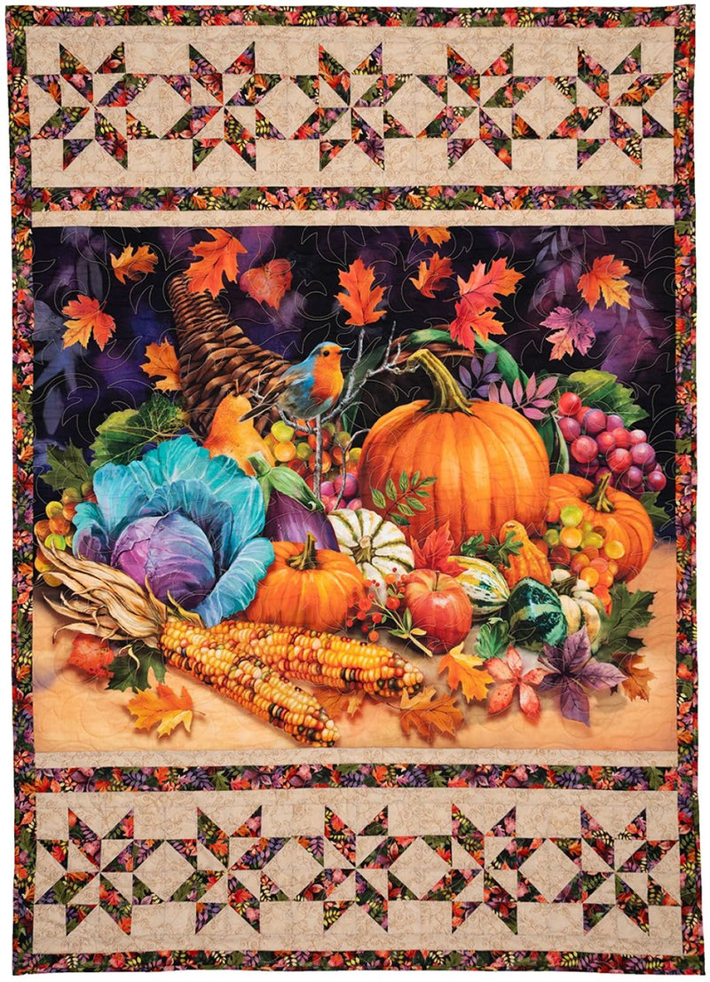 Colorful quilt with autumn-themed design featuring pumpkins, corn, and leaves from Panel Perfect 3-Yard Quilts.
