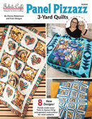 Front cover of a quilting pattern book titled 'Panel Pizzazz 3-Yard Quilts' by Fabric Cafe, showing three quilt designs: a patchwork quilt with heart motifs, a floral quilt with blue and purple flowers, and a blue geometric quilt. A small inset photo shows two women standing behind one of the quilts.