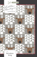 Reindeer Xing Quilt pattern cover with reindeer design on a gray and white background, featuring the brand 'Lella Boutique'.