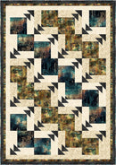 Quilt with geometric pattern featuring triangles and squares in earthy tones from the Step it Up with 5-Yard Quilts book.