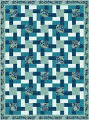 Quilt with blue and white geometric pattern from the Step it Up with 5-Yard Quilts book.