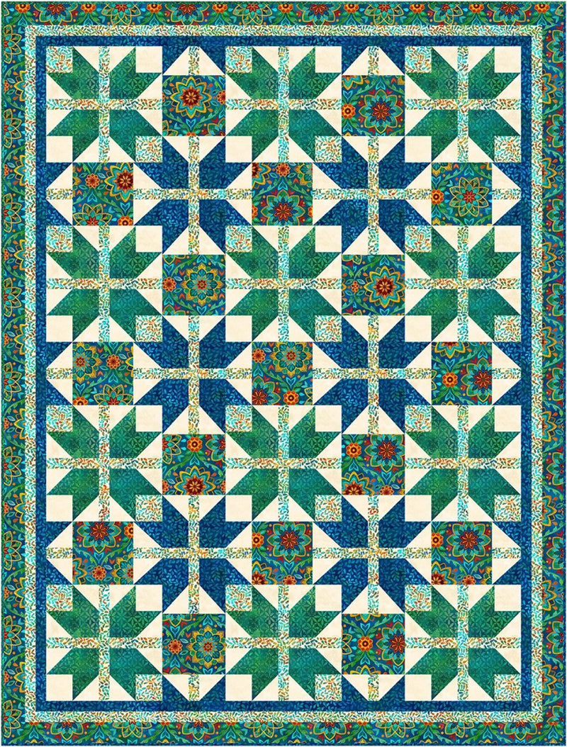 Quilt with geometric pattern in blue, green, and white from the Step it Up with 5-Yard Quilts book.