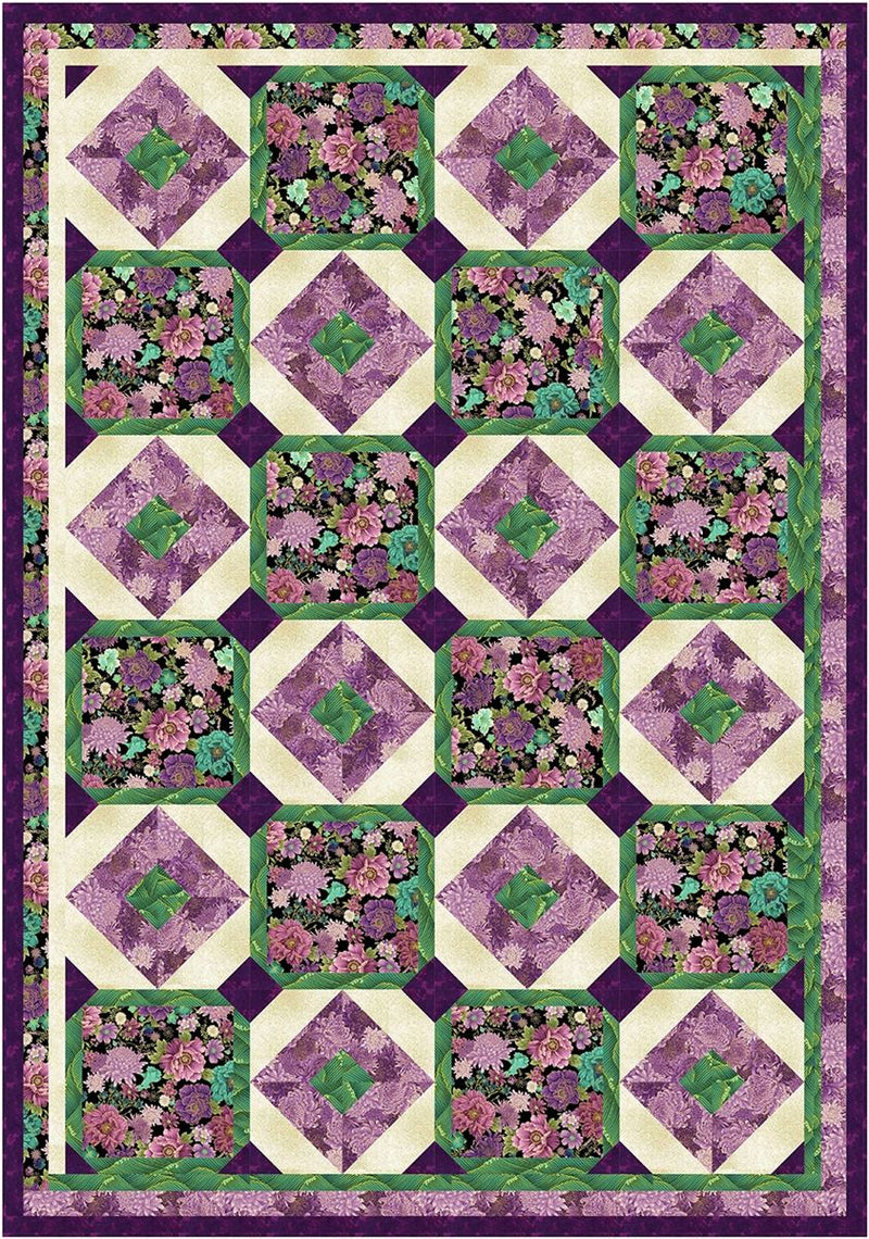 Quilt with floral pattern in purple, green, and pink on a purple border from the Step it Up with 5-Yard Quilts book.