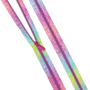 Tula Pink Floral Reef Making Waves Coil Zippers with swirling pattern on a white background.