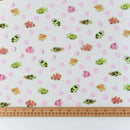 Tula Pink Floral Reef School Crossing Half Yard Cut Vinyl with colorful fish designs and a ruler to show scale.