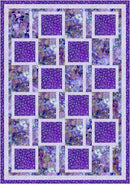 Quilt with a purple and blue floral pattern from Weekend 3-Yard Quilts